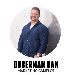 Doberman Dan - Marketing Camelot